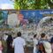 John Lennon Wall (Lennonova Zeď) Di Praha Adalah Dinding Graffiti Ikonik Yang Penuh Warna, Terletak Di Velkopřevorské Náměstí (Dekat Kampa Island, Malá Strana), Tidak Jauh Dari Charles Bridge. Dinding Ini Milik Knights Of Malta.